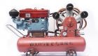 Diesel driven piston air compressor